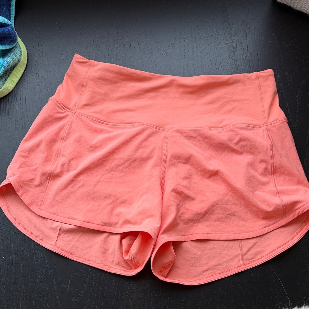Peachy coral lululemon shorts